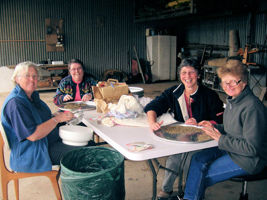 Seedbank volunteers cleaning seed in 2009
